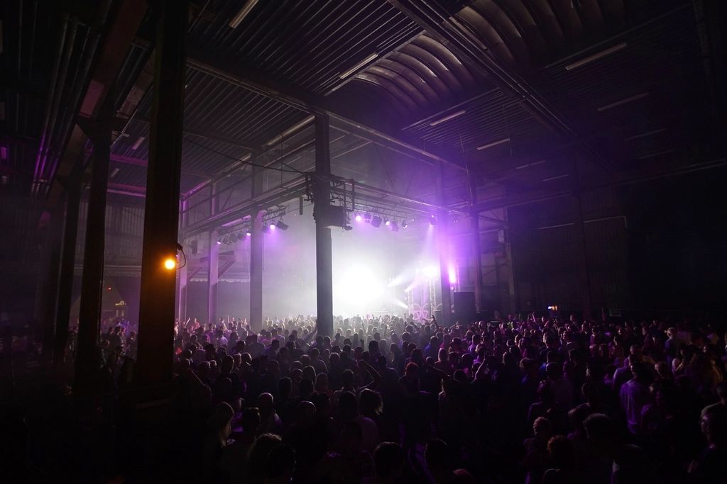 A performance on the stage, seen from the room